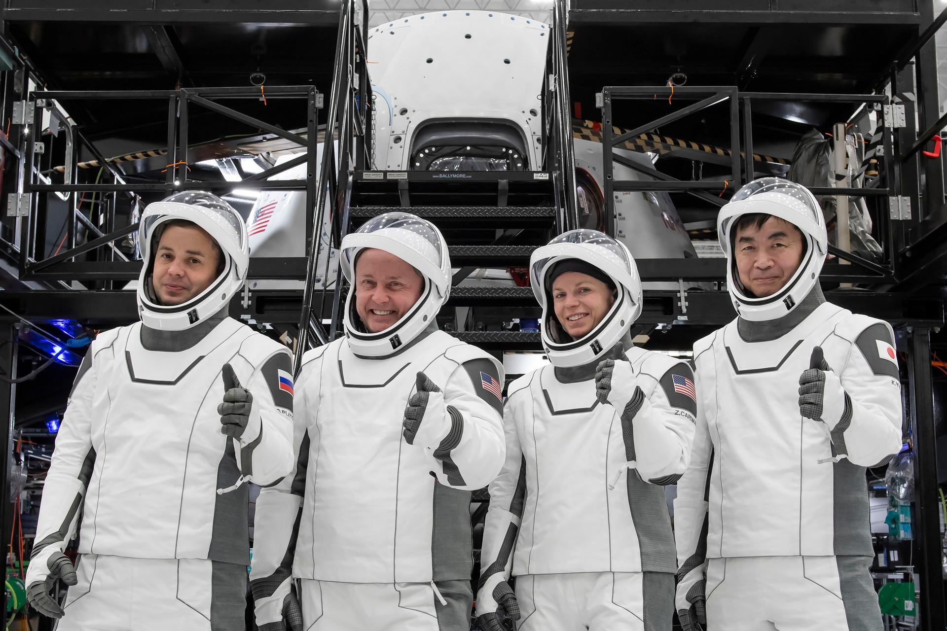 The crew of NASA’s SpaceX Crew-11 mission pose for a photo during a training session for their upcoming trip to the International Space Station at SpaceX facilities in Florida. From left: Oleg Platonov, Mike Fincke, Zena Cardman, and Kimiya Yui.